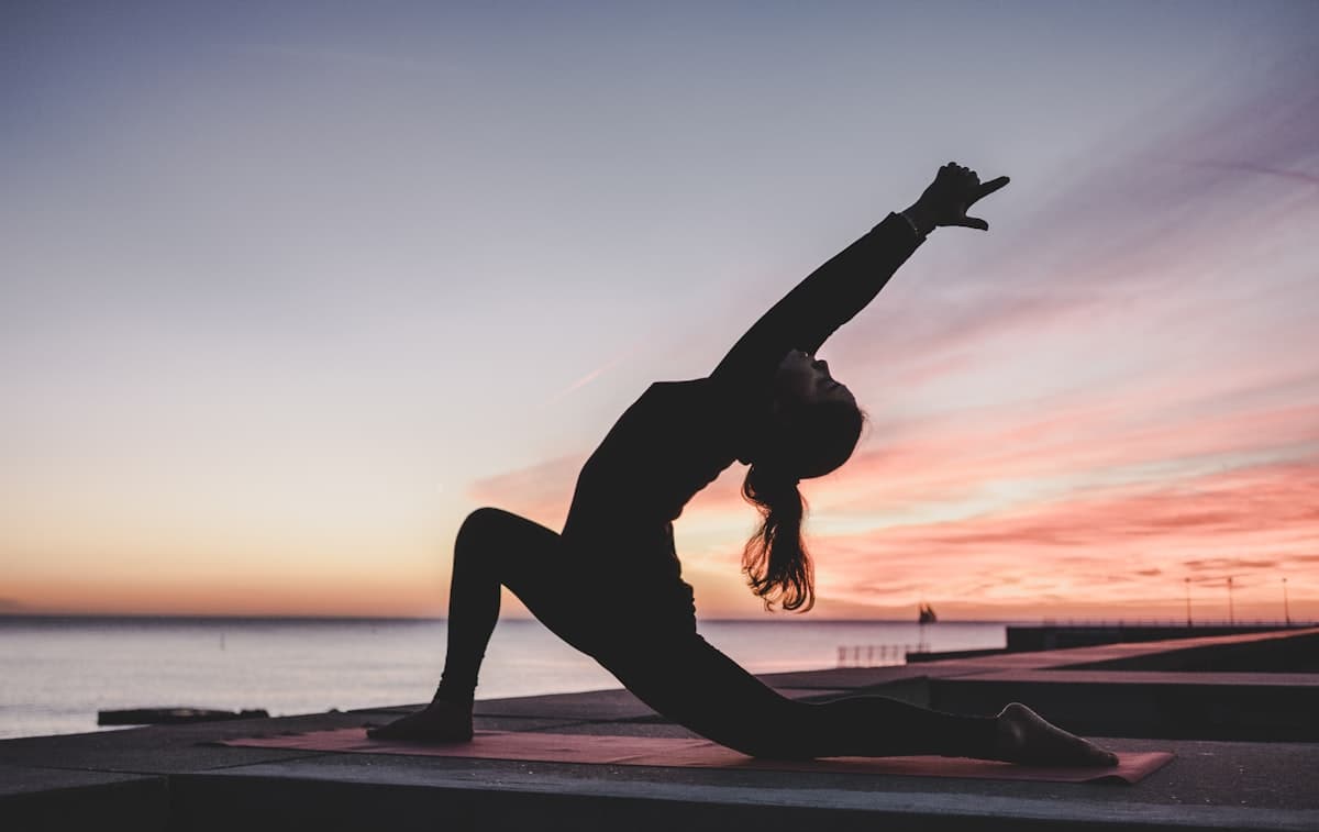 Yoga and deep breathing by the water
